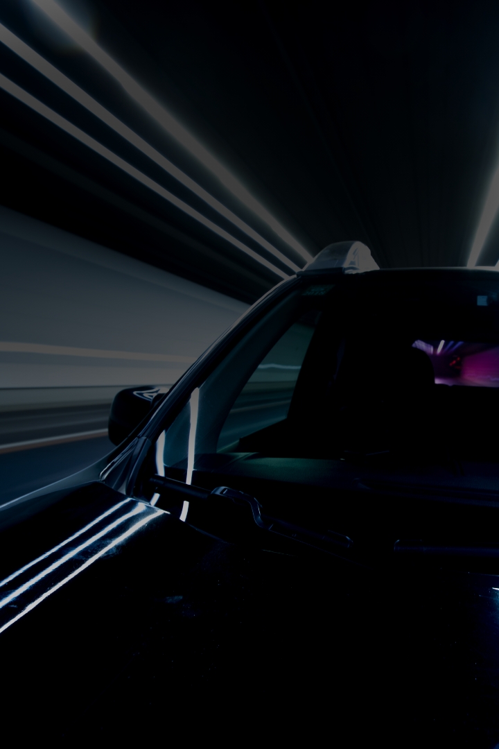 Automotive fast-driving car with light reflections 